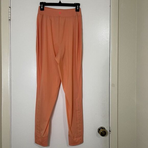 LULULEMON orange peach lightweight magnetic slit hem jogger pants 4 - Picture 5 of 8